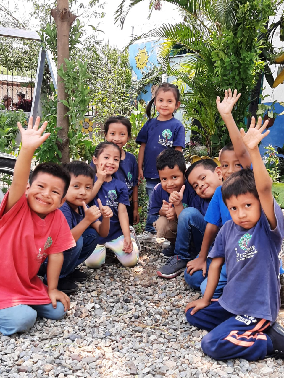 Children in the HIM daycare in Pueblo Modelo, Guatemala interacting with one another.