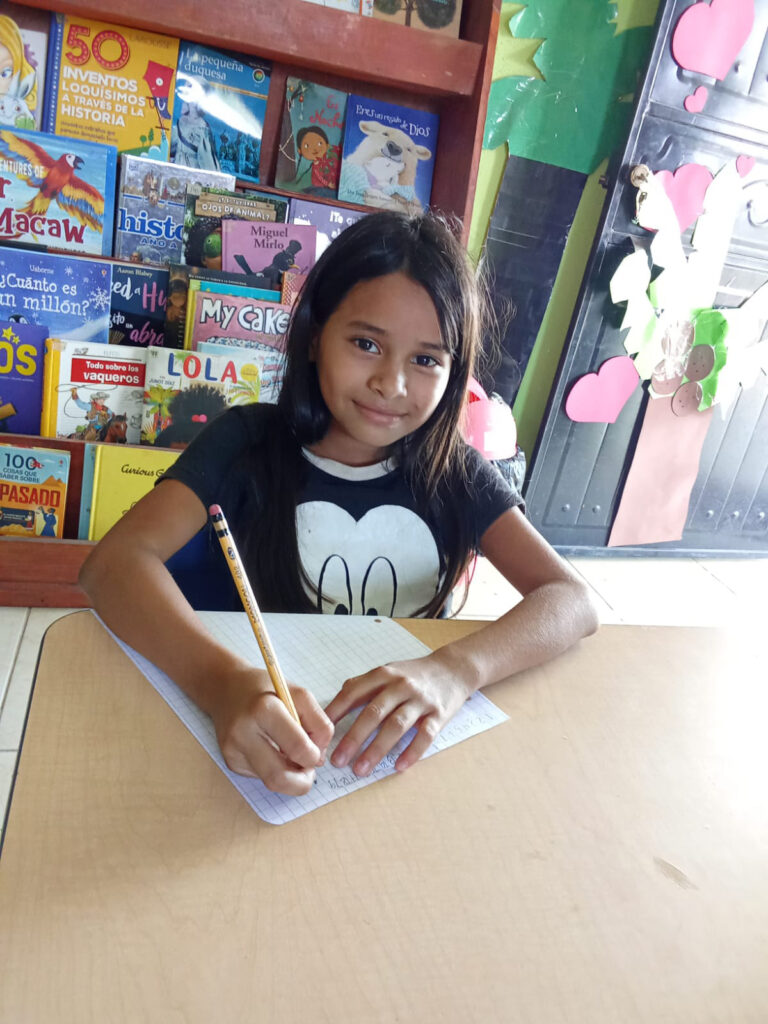 Child in the HIM sponsorship program in Pueblo Modelo, Guatemala.